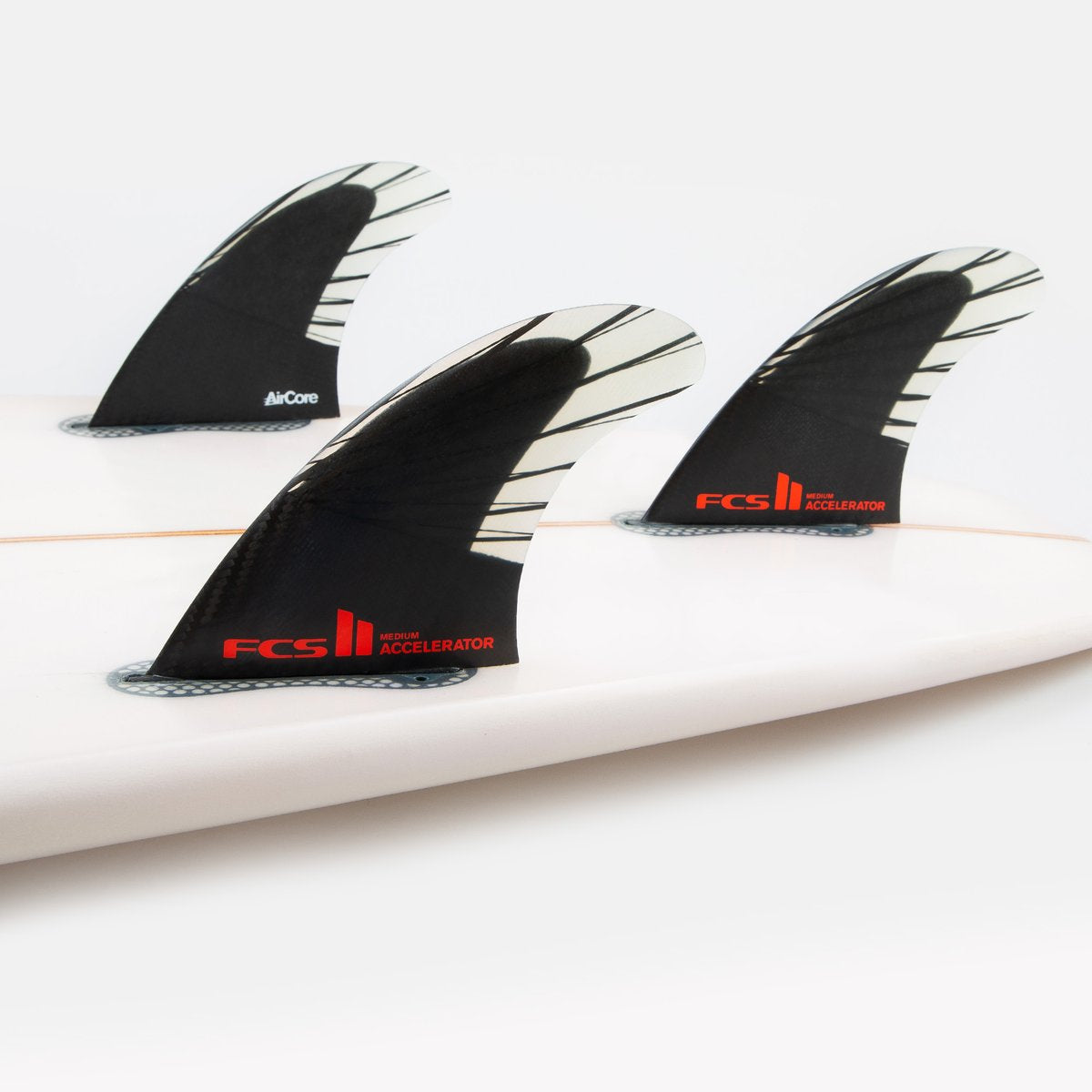 FCS II ACCELLERATOR PC CARBON TRI FIN SET