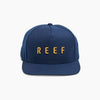 REEF MOTION SNAP BACK CAP -INDIGO BLUE / GOLD LOGO